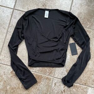 Caution to the Wind Black Wrap Top